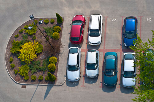 Cars parked in a parking lot.
